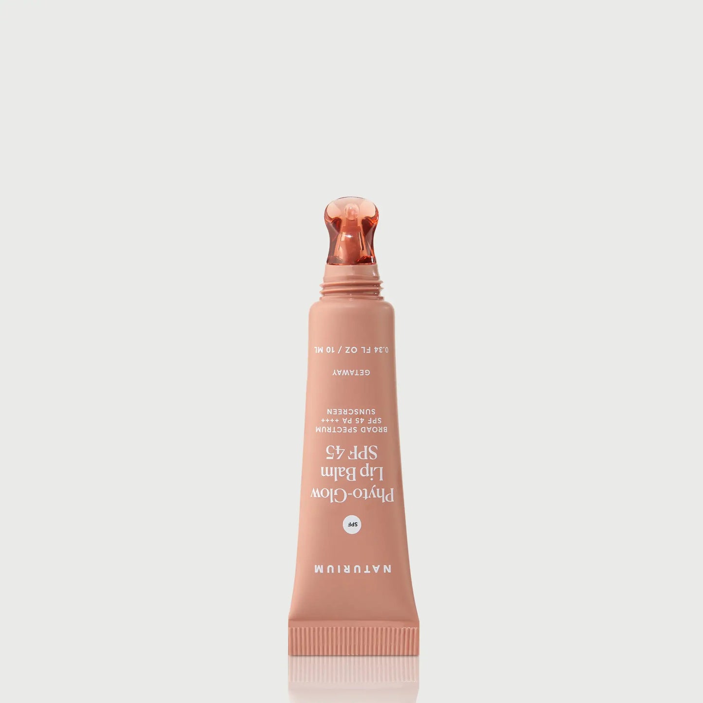 phyto-glow-lip-balm-spf-45-getaway-l1 NATR-10126_PhytoGlow_SPF_Getaway_primary_nocap_bonebkgd_1.webp