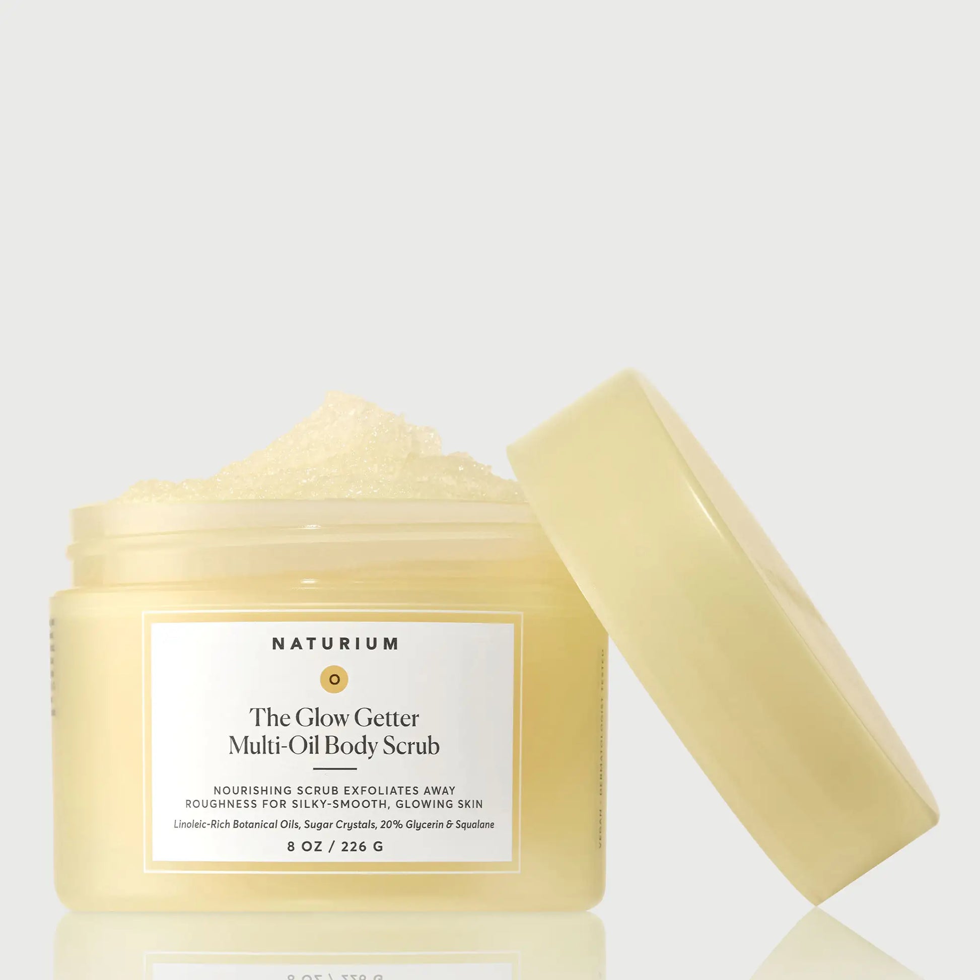 the-glow-getter-multi-oil-body-scrub-g8 NATR-40028-GlowGetter-Multi-Oil-Body-Scrub-Front-CapOff-bonebkgd.webp