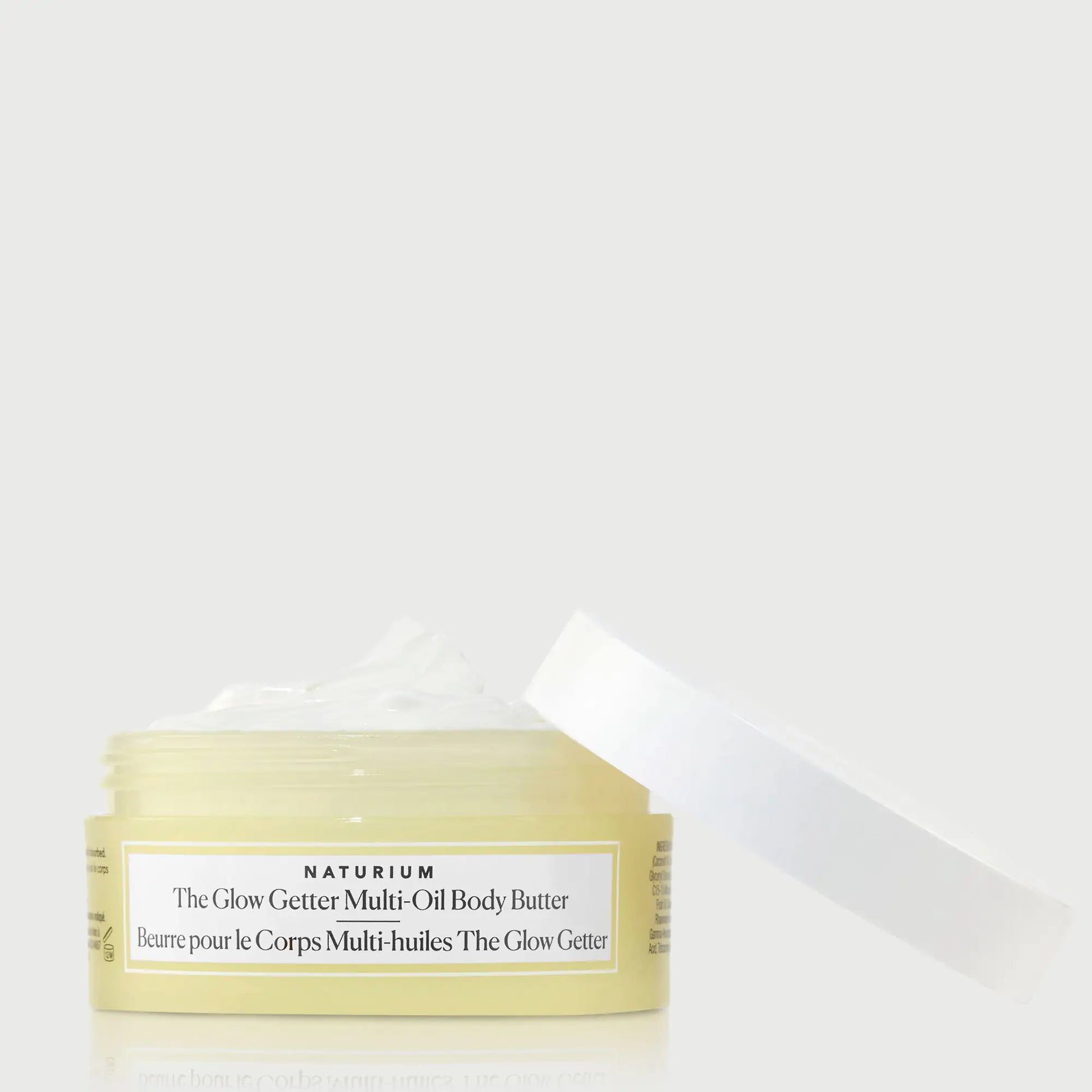 the-glow-getter-multi-oil-body-butter-travel-size-p8 NATR-40115_Glow-Getter-Body-Butter-Mini_front_capoff_bonebkgd.webp